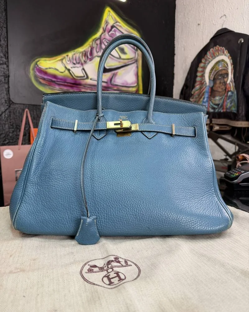 Sac à main en cuir bleu avant rénovation